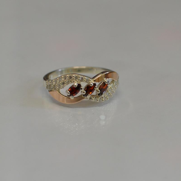 Срібна каблучка з золотими пластинами