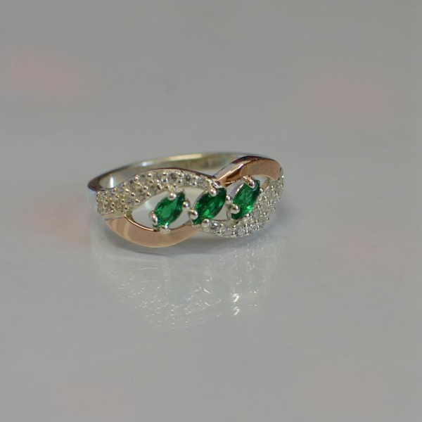 Срібна каблучка з золотими пластинами