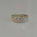 Срібна каблучка з золотими пластинами