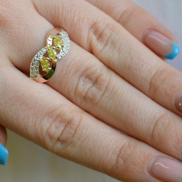 Срібна каблучка з золотими пластинами