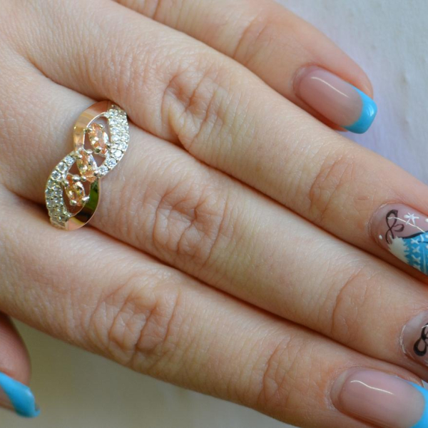 Срібна каблучка з золотими пластинами