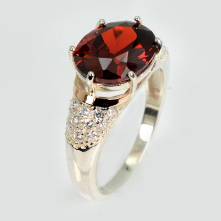 Срібна каблучка з золотими вставками