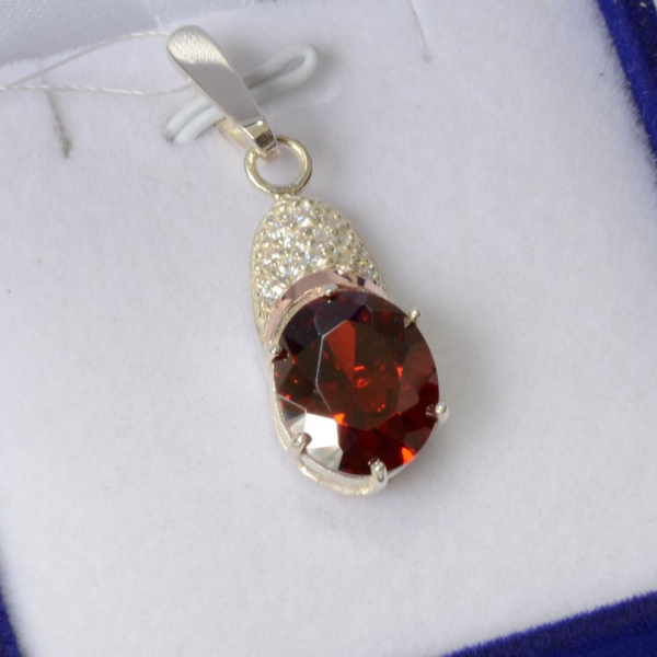 Серебряная подвеска с золотими вставками