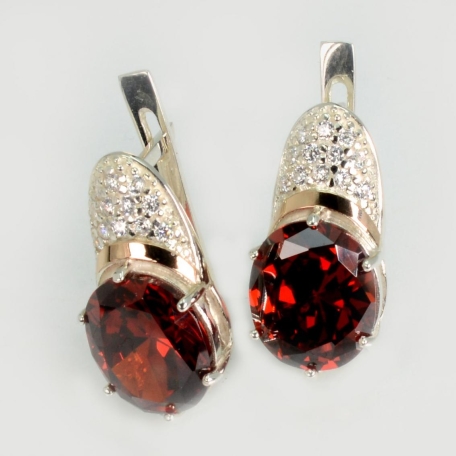 Срібні сережки з золотими пластинами