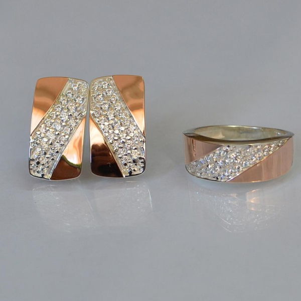 Срібний набір з золотими пластинами