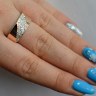 Срібна каблучка з золотими вставками