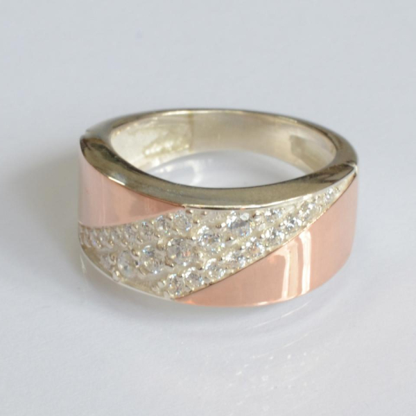 Срібна каблучка з золотими вставками