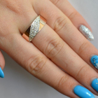 Срібна каблучка з золотими вставками