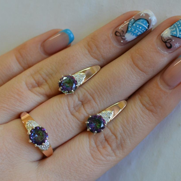 Срібний набір з золотими вставками