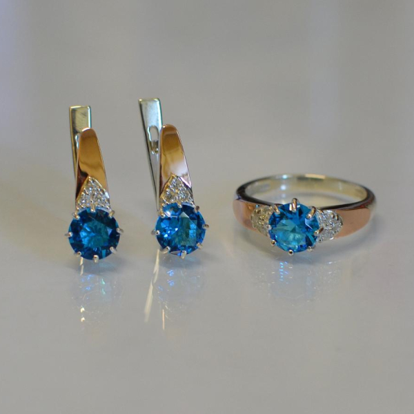 Срібний набір з золотими вставками