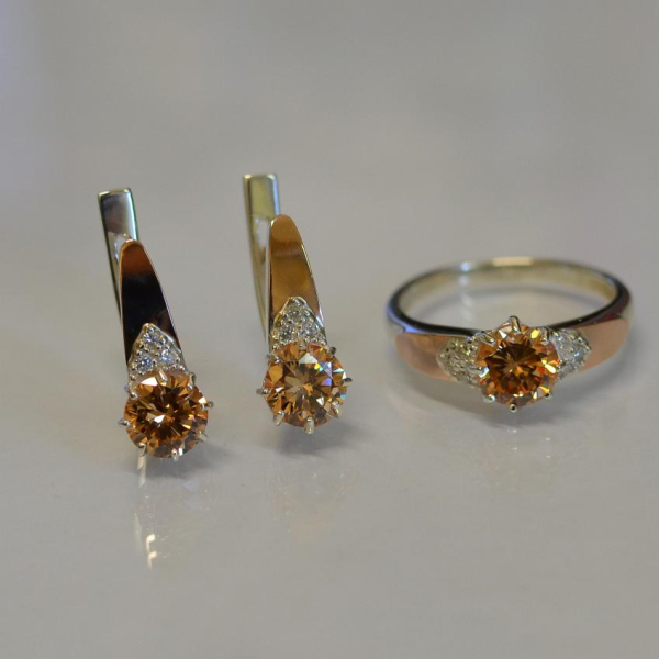 Срібний набір з золотими вставками