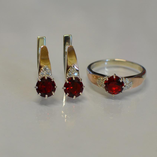 Срібний набір з золотими вставками