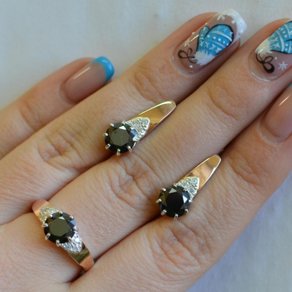 Срібний набір з золотими вставками