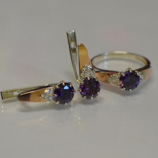 Срібний набір з золотими вставками