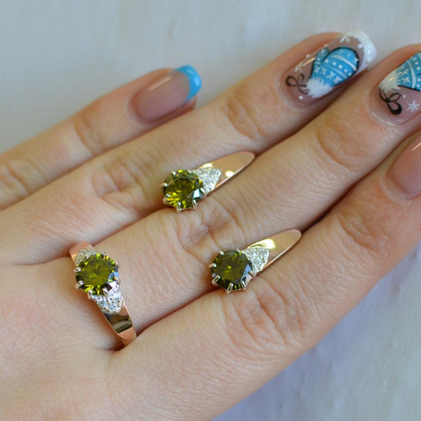 Срібний набір з золотими вставками