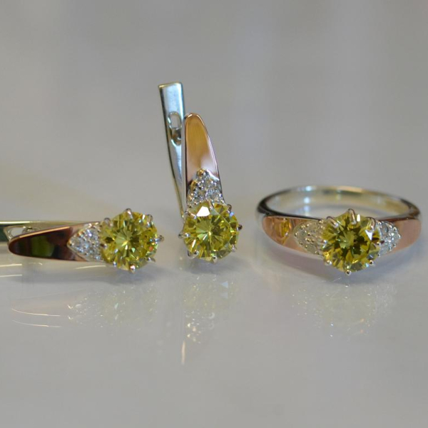 Срібний набір з золотими вставками