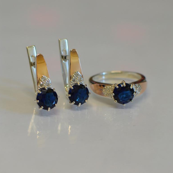 Срібний набір з золотими вставками