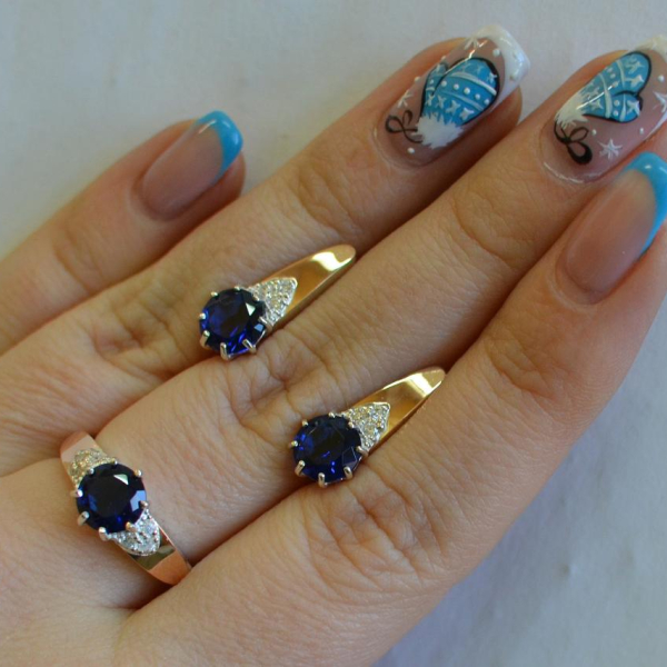 Срібний набір з золотими вставками