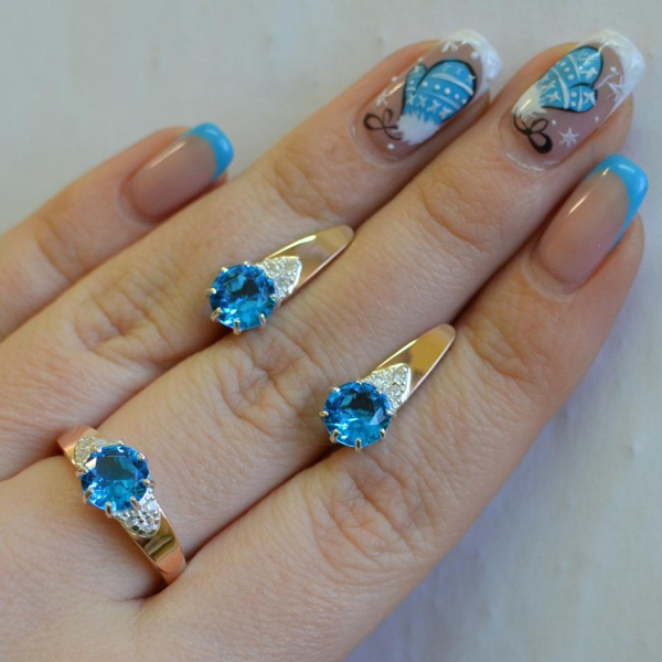 Срібний набір з золотими вставками