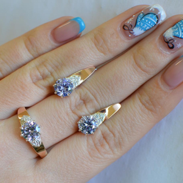 Срібний набір з золотими вставками