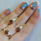 Срібний набір з золотими вставками