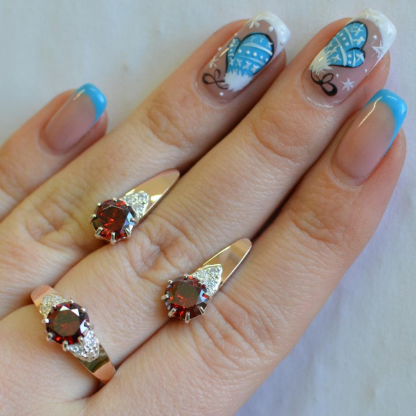 Срібний набір з золотими вставками