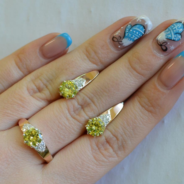 Срібний набір з золотими вставками