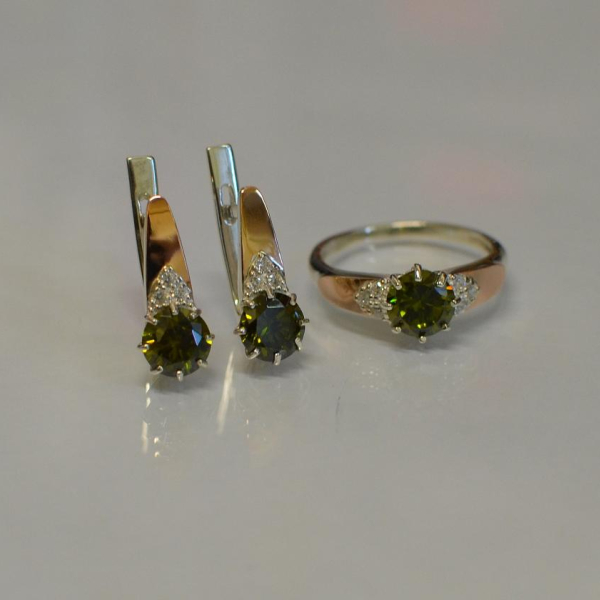 Срібний набір з золотими вставками