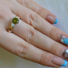 Срібна каблучка з золотими вставками