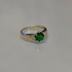 Срібна каблучка з золотими вставками