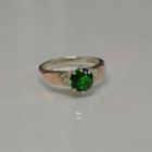 Срібна каблучка з золотими вставками