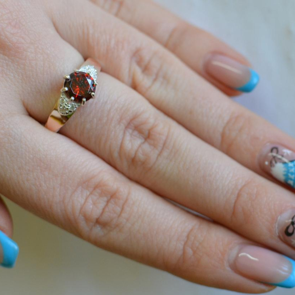 Срібна каблучка з золотими вставками