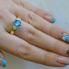 Срібна каблучка з золотими вставками