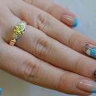 Срібна каблучка з золотими вставками