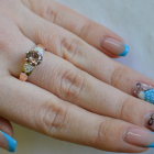 Срібна каблучка з золотими вставками