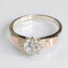 Срібна каблучка з золотими вставками