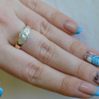 Срібна каблучка з золотими вставками