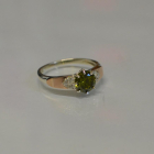 Срібна каблучка з золотими вставками