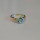 Срібна каблучка з золотими вставками