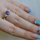 Срібна каблучка з золотими вставками