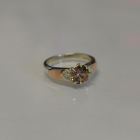 Срібна каблучка з золотими вставками