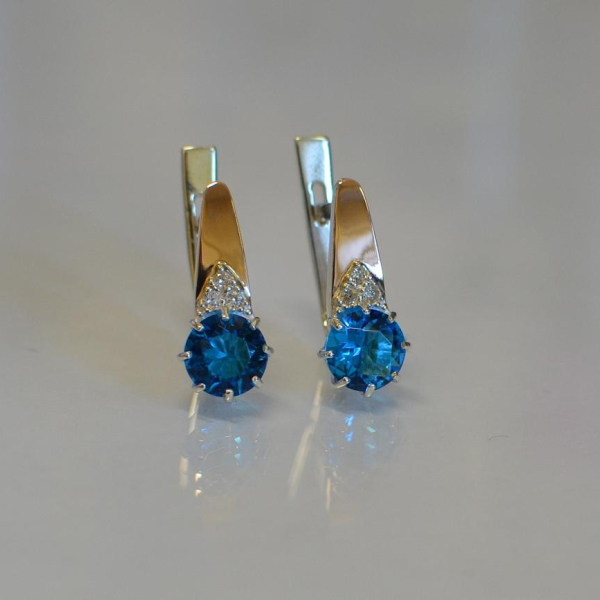 Срібні сережки з золотими вставками