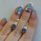 Срібні сережки з золотими вставками