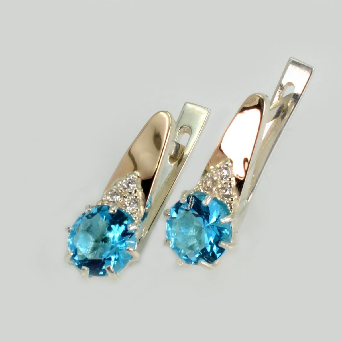 Срібні сережки з золотими вставками