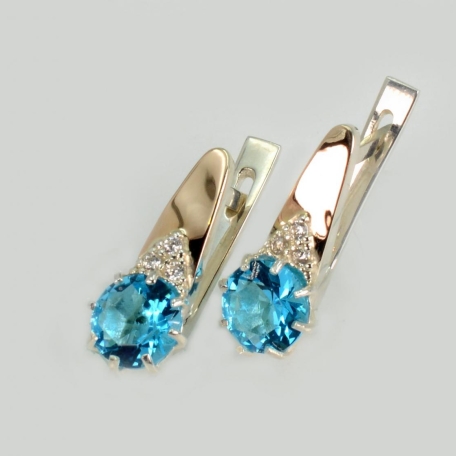 Срібні сережки з золотими вставками