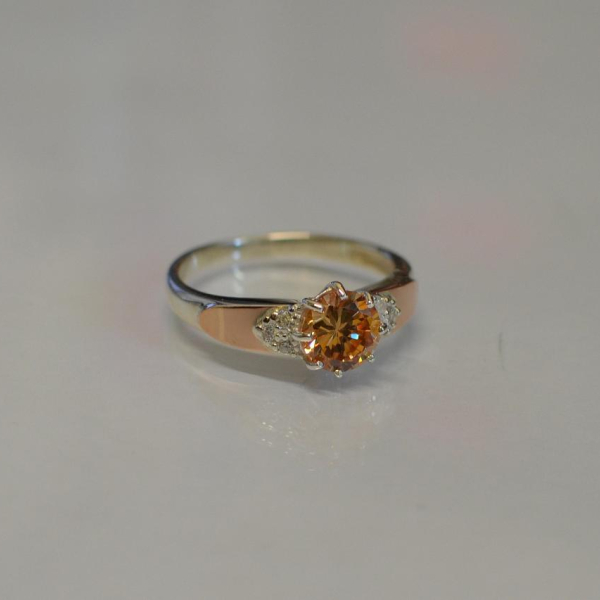 Срібні сережки з золотими вставками