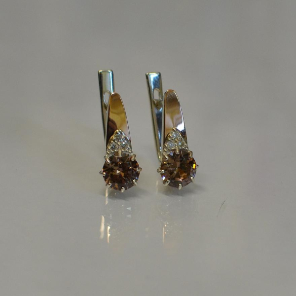 Срібні сережки з золотими вставками