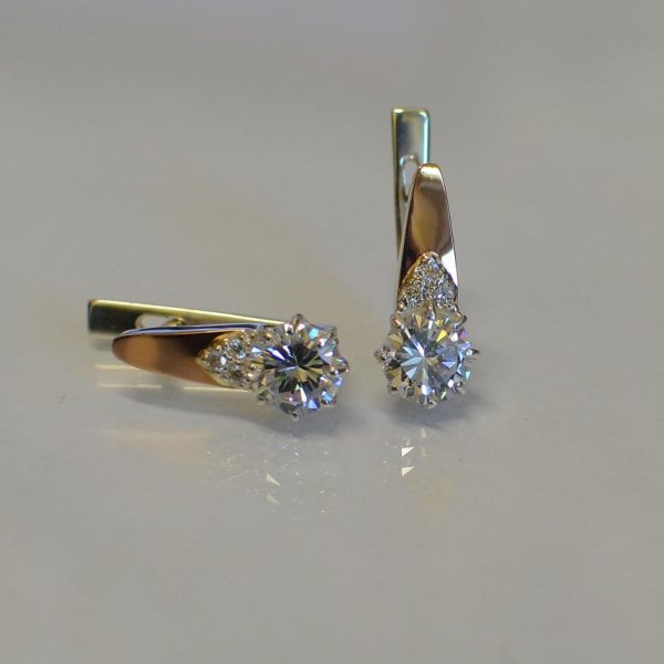 Срібні сережки з золотими вставками