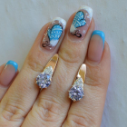 Срібні сережки з золотими вставками