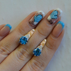 Срібні сережки з золотими вставками